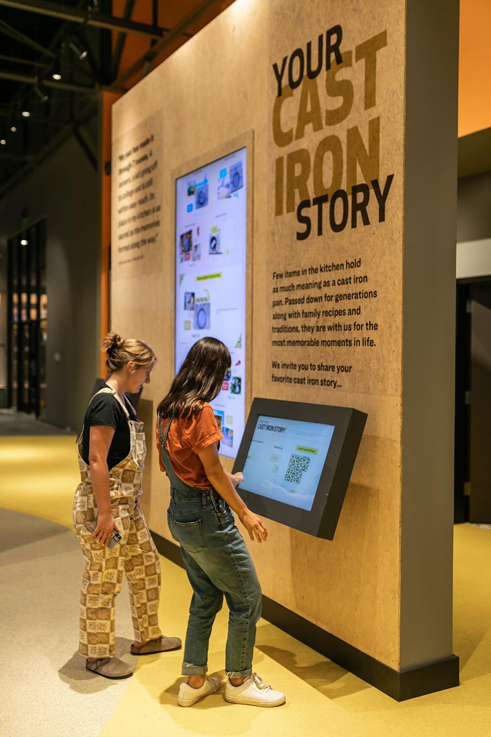 Museum visitors interact with an exhibit created by Relative Scale at the Lodge Museum